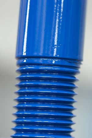 Close-up of shiny, blue bolt. Very shallow depth of field.の写真素材