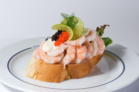 Seafood sandwich with shrimps, roe of capelin, mayonnaise, lime and dill.の写真素材