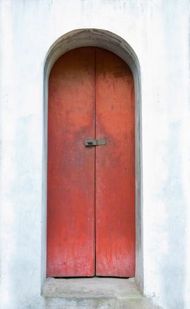 Old, tall, red door at the Temple of Literature, Van Mieu, in Hanoi.の写真素材