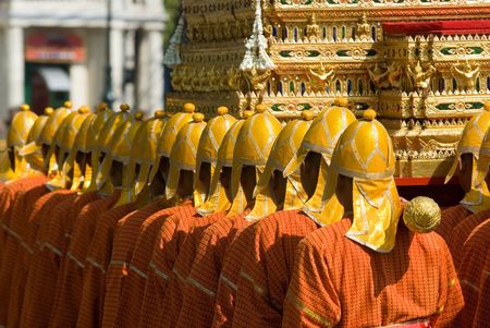 Thai soldiers in traditional uniforms during a royal funeral procession in Bangkok. Shallow depth of...