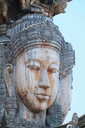 Head of religious figure at a wooden temple in Pattaya, Chonburi province, Thailand.の写真素材