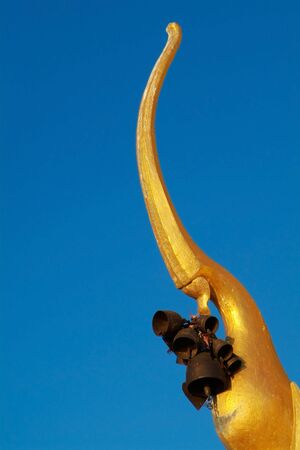 Detail of Golden Cheddi with chimes at a temple in the Samut Prakan province in Thailand.の写真素材
