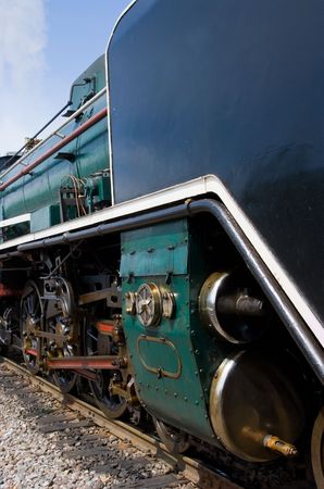 Detail of black and green steam engine.の写真素材