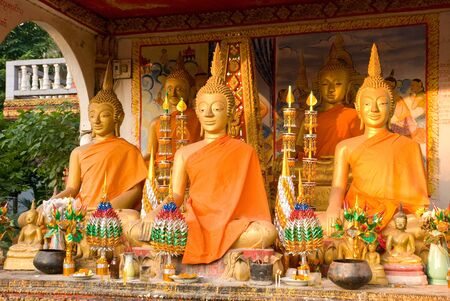 Buddha images at Wat That Luang in Vientiane, Laos, one of the most important temples of the city. Photo taken in the morning sun.の写真素材