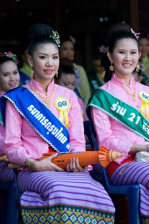 CHIANG MAI, THAILAND - JANUARY 15: Participants in the beauty contest during the annual Umbrella festival in Chiang Mai, Thailand on January 15, 2010. The festival is held in Bo Sang, where traditional umbrellas have been made for more than 100 years.のeditorial素材