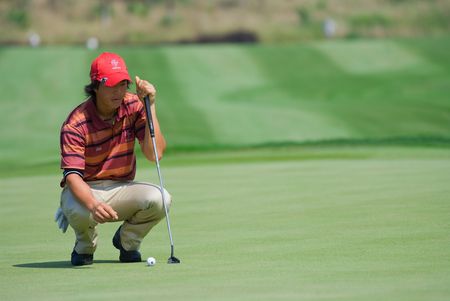 BANGKOK, THAILAND - JANUARY 10: Japanese golf player Ryo Ishikawa preparing a put at the Royal...