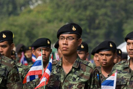 BANGKOK, THAILAND - DECEMBER 5: Army soldiers in camouflage uniforms parading during the celebration of the 82nd birthday of H.M. King Bhumipol Adulyadej in Bangkok, Thailand on December 5 2009.のeditorial素材