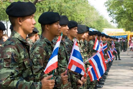 BANGKOK, THAILAND - DECEMBER 5: Army soldiers in camouflage uniforms parading during the celebration of the 82nd birthday of H.M. King Bhumipol Adulyadej in Bangkok, Thailand on December 5 2009. のeditorial素材