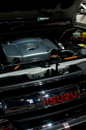 BANGKOK - DECEMBER 2:  Radiator grill and engine of Isuzu D-Max X-Series pickup truck at Motor Expo,...