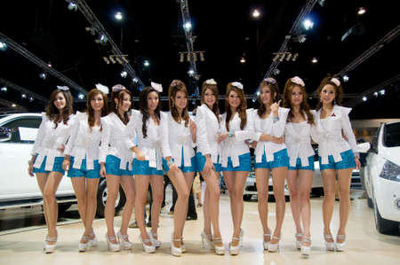 BANGKOK - DECEMBER 2: Female presenters at the Mitsubishi booth during Motor Expo, Impact on December 2, 2010 in Bangkok, Thailand.のeditorial素材