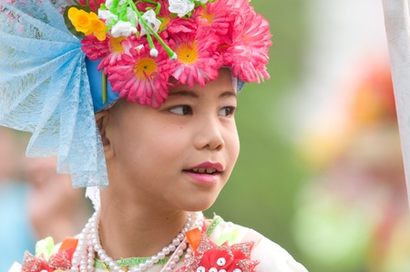 MAE HONG SON - APRIL 6: Young boy participating in the traditional Poy Sang Long Ceremony where young Shan boys are dressed like princes and paraded through the streets before entering monkhood on April 6, 2011 in Mae Hong Son, Thailand.のeditorial素材