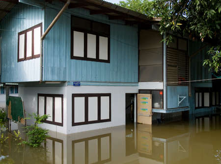 AYUTTAYA, THAILAND - OCTOBER 5: Flooded school building during the monsoon season in Ayuttaya, Thailand on October 5, 2011.のeditorial素材