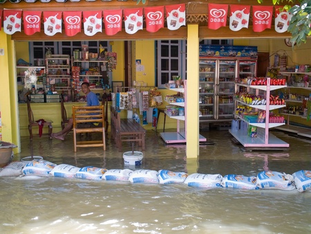 AYUTTAYA, THAILAND - OCTOBER 5: Local shop flooded during the monsoon season in Ayuttaya, Thailand...
