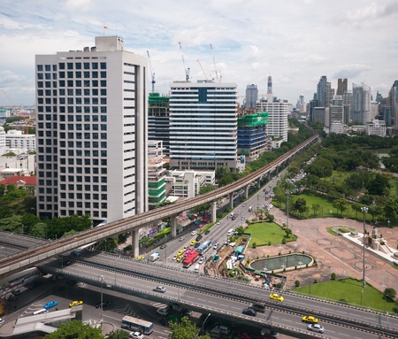 Bangkok view with Rama IV road in the foreground and Rachadamri road with Silom Sky-train line...
