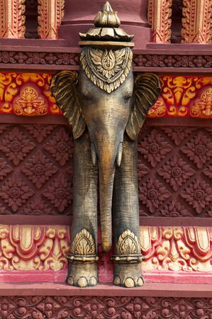 Elephant sculpture and wall detail at Wat Set Tbo in Kandal Province, Cambodia.の写真素材