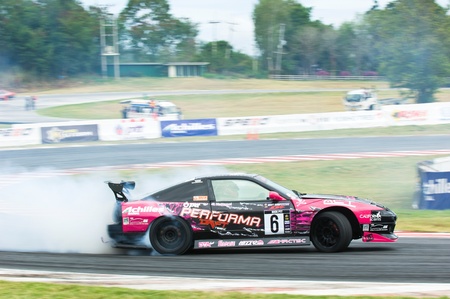NAKHON RATCHASIMA - AUGUST 12: Khun Mick of PTT racing at M-150 Storm Drift Competition at Bonanza...