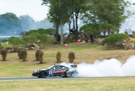 NAKHON RATCHASIMA - AUGUST 12: Khun Em of PTT racing at M-150 Storm Drift Competition at Bonanza...