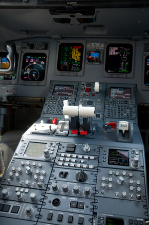 Cockpit of 100 seat, 2 engine jet airliner  Shallow depth of field with the nearest instruments in...