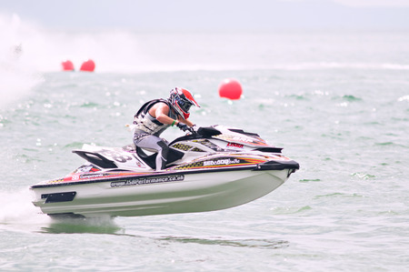 PATTAYA - DECEMBER 6: James Bushell from The United Kingdom competing during Thai Airway International Jet Ski World Cup at Jomtien Beach, Pattaya, Thailand on December 6, 2014.のeditorial素材