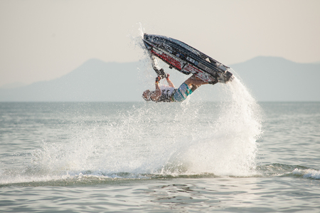 Pattaya, Thailand - December 6, 2015: Lee Stone from The UK during with his winning performance at the freestyle competition during the International Jet Ski World Cup at Jomtien Beach, Pattaya, Thailand.のeditorial素材