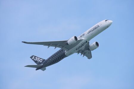 Singapore - February 14, 2016: Airbus A350 XWB during its performance at Singapore Airshow at Changi Exhibition Centre in Singapore.のeditorial素材