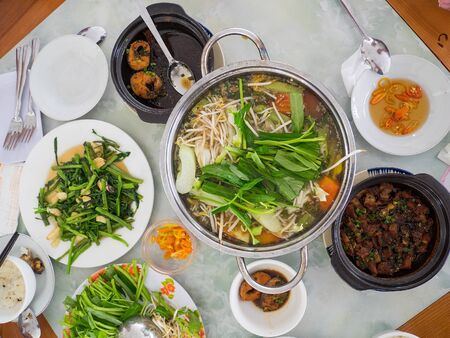 Vietnamese food at a lunch table in Vietnamの写真素材