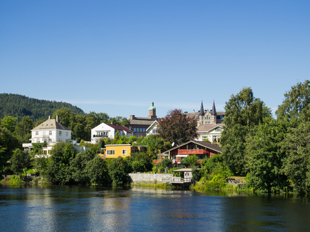 Nidelven, the Nid River, in Trondheim, the third largest city of Norway, with the Ila District in the background.の写真素材