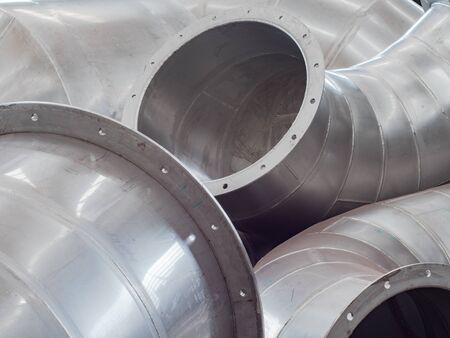 Stainless steel ducting parts for an industrial size ventilation system.の写真素材