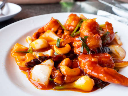 Thai food, prawns with cashew nuts, a very popular dish among visitors to Thailand. Shallow depth of...