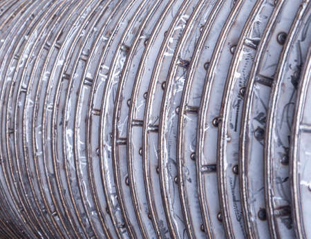 Disks of an industrial disk dryer for drying of animal and fish byproducts to produce protein meals for animal feed. Shallow depth of field.の写真素材