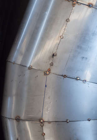 Tack welding of stainless steel ducting. Tack welds are small and temporary welds that hold parts...