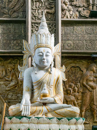 Buddha image at Gangaramaya Temple, Colombo, Sri Lanka.