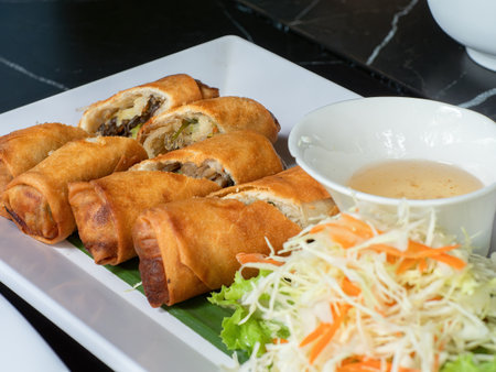 Deep fried spring rolls with mushrooms and glass noodles, a typical East and Southeast Asian...