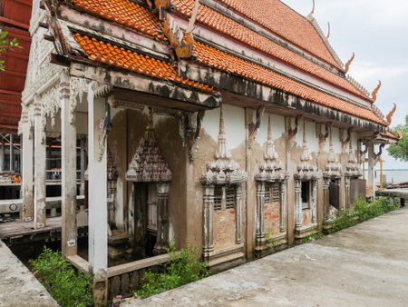 Wat Khun Samut Chin, Samut Prakan Province of Thailand. Wat Khun Samut Chin is a temple now located out in the Gulf of Thailand, after erosion removed the village around it. The temple has been damaged by sea water intrusion and storms, but is being restored and protected from the advancing sea.の写真素材