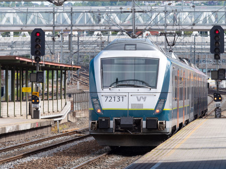 Oslo, Norway - August 20, 2022: Type 72 local train built by AnsaldoBreda in the livery of Vy, the Norwegian government railway operator, at Oslo Central Station in Norway.のeditorial素材