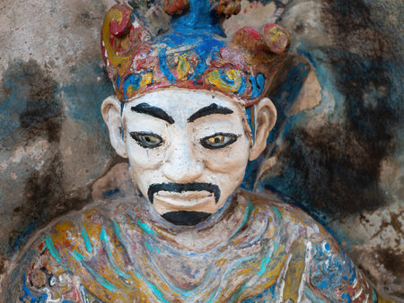 Thanh image at Den Doc Cuoc, Tam Toa Thanh Mau, a small temple for Thanh, Thanh Giong  at the southern end of Sam Son Beach in the Thanh Hoa province of Vietnam. Thanh Giong is the protector against invaders and other dangers.の写真素材