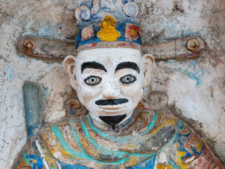Thanh image at Den Doc Cuoc, Tam Toa Thanh Mau, a small temple for Thanh, Thanh Giong  at the southern end of Sam Son Beach in the Thanh Hoa province of Vietnam. Thanh Giong is the protector against invaders and other dangers.の写真素材