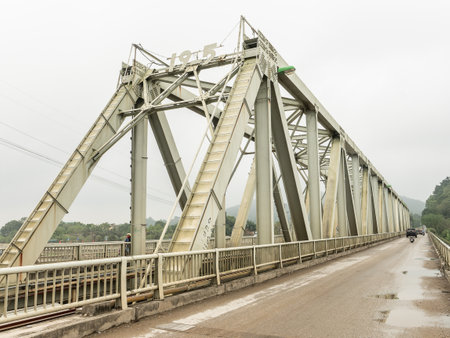 The Ham Rong Bridge in Thanh Hoa, Vietnam. The bridge was built by the French during colonial times and bombed hundreds of times by the Americans during the Vietnam War.の写真素材