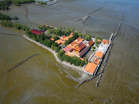 Wat Khun Samut Chin in Samut Prakan, Thailand. There was a village around the temple, but when mangrove forests where cleared for shrimp farms, erosion removed the village by 3-5 metres per year.の写真素材
