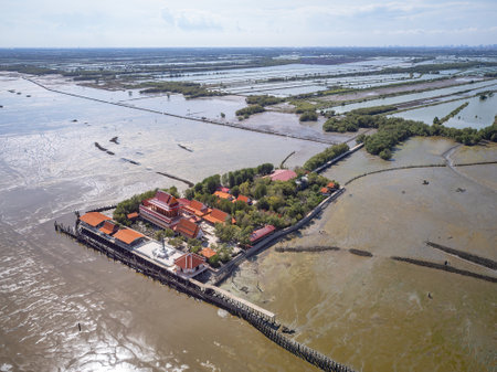 Wat Khun Samut Chin in Samut Prakan, Thailand. There was a village around the temple, but when mangrove forests where cleared for shrimp farms, erosion removed the village by 3-5 metres per year.の写真素材