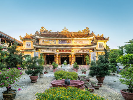 The Phap Bao Temple in Hoi An, Quang Nam province, Vietnam. The old city of Hoi An is a World Heritage Site, and famous for its well preserved buildings and street structure dating back from the days when it was a major trading port.のeditorial素材