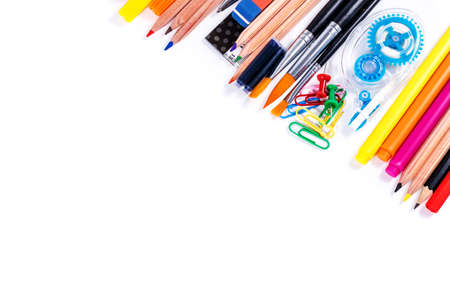 School and office supplies over white office table. Top view with copy space.の写真素材