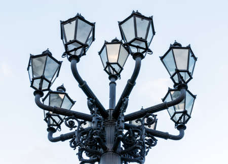Old-fashioned city street lamp in the nigt. Gendarmenmarkt in Berlin, Germanyの写真素材