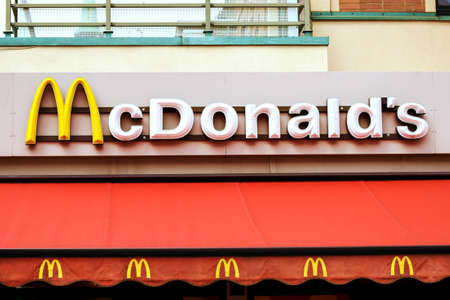 Rostock, Germany - August 22, 2016: McDonalds logo. It is the world's largest fast food chain.のeditorial素材