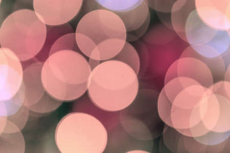 Christmas background. Festive abstract background with bokeh defocused lightsの写真素材