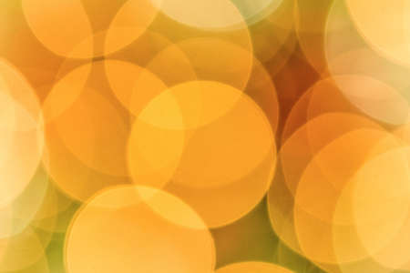 Christmas background. Festive abstract background with bokeh defocused lightsの写真素材