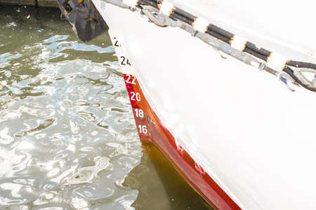 Draft marks on a ships bow, waterlineの写真素材