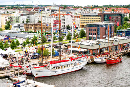 Rostock, Germany - August 2016: lots of sailing ship on Hanse Sail. Aerial photographyのeditorial素材