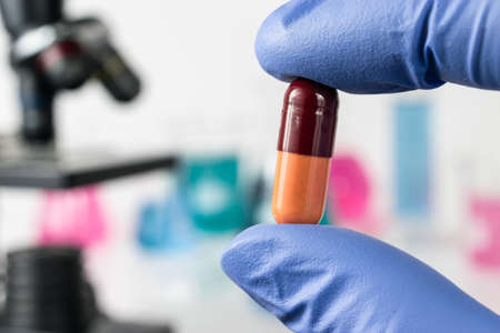 Analysis of medicaments in laboratory. Medical Research and diseases Science. Microscope and laboratory vesselsの写真素材