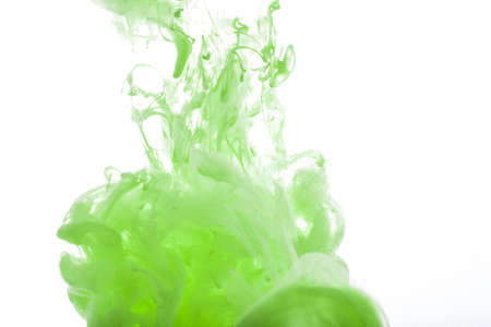 green acrylic color. Ink swirling in water. Color explosionの写真素材